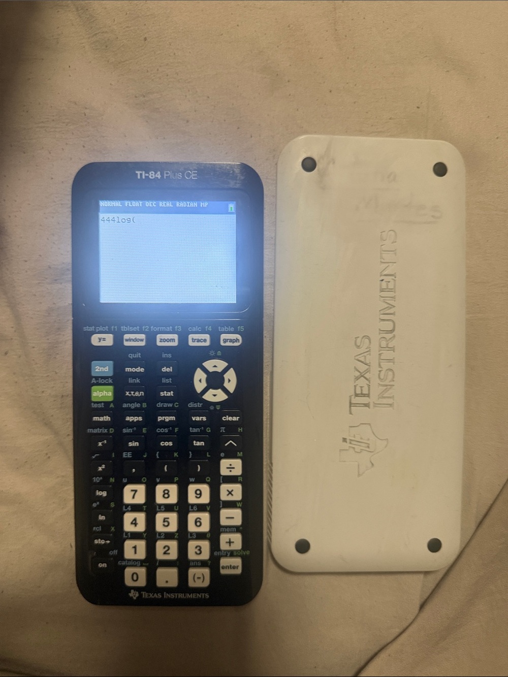 Texas Instruments TI-84 Plus CE Graphing Calculator - Black with White Cover